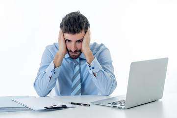 Portrait of frustrated businessman in pain with headache suffering from stress