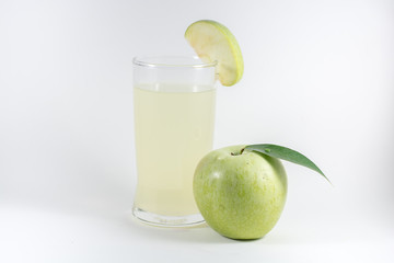Fototapeta na wymiar glass of juice and green apple on white background