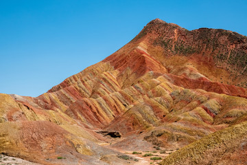 Fototapeta premium China. Zhangye Danxia geological park, China. Situated in a canyon with beautiful rock formations, sand stone, geological layers of stone and stunning views. Zhangye, Gansu province, China. 