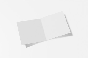 Mockup square booklet, brochure, invitation isolated on a white background with hard cover and realistic shadow. 3D rendering.