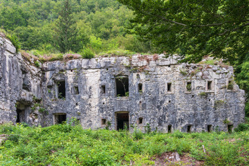 Fototapeta na wymiar Detail view on Walls of Fort Hermann. Crumbling World War I Fortress near Mount Rombon. Bovec, Gorizia, Slovenia.