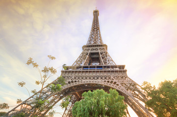 Fototapeta na wymiar Beautiful landscape Eiffel tower in summer Paris, France under the sunset sky, Eiffel Tower the most romantic tourist attraction and the symbol of Paris.
