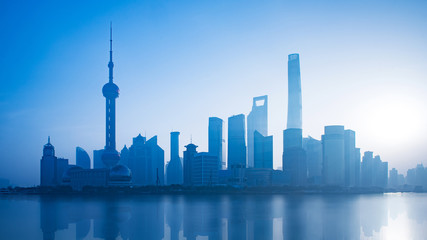 Panoramic view of shanghai skyline and huangpu river in morning with sunrise, China.