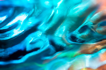 Abstract colorful wave pattern background. Colorful water wave background with bright shining surfaces. Summer or spring theme.