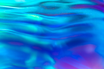 Abstract blue wave pattern background. Colorful water wave background with bright shining surfaces. Summer or spring theme.