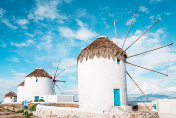 The white windmills of Mykonos Island, Kato Mili close to Little Venice, Cyclades, Greece - obrazy, fototapety, plakaty