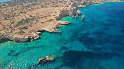 Aerial drone photo of tropical exotic white rock secluded rocky bay with turquoise sea