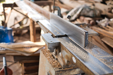 Wood surface planer machine. Woodworking tools and technology.