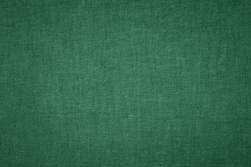 Dark green fabric texture background