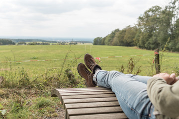 Wanderer makes rest. Feet.