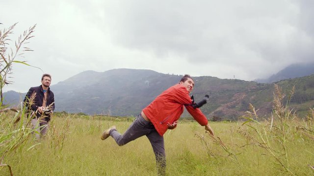 Adult Man, Throwing A Drone By Hand For Making A Research In A Field In Ecuador