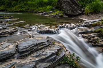 silky smooth waterfall. Long exposure shot of crystal clear fall at hoang su phi, vietnam. Ha Giang province landscape. Yoga and meditation concept. Silky smooth fall. 