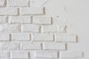 white brick wall with empty space