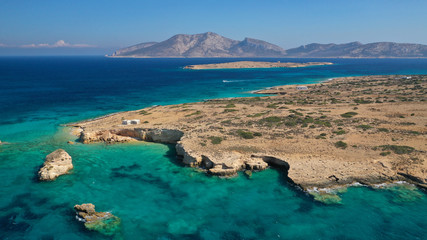 Aerial drone photo of secluded paradise beach of Kasteli in North area of Kato Koufonissi island,...