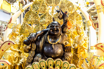 Golden Smiling Buddha in temple