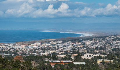 View of Monterey Bay in California, from a nearby hilltop, including cities of Monterey and...