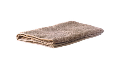 Side view of brown soft terry towel isolated on white