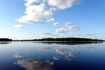 Finnish lake scenery in summer with blue sky