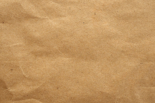 Old brown eco recycled kraft paper texture cardboard background