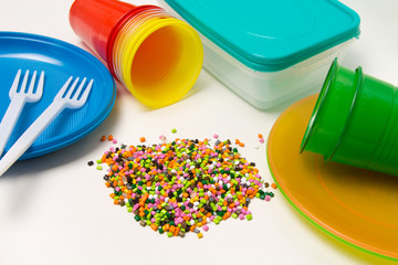 Plastic granules and disposable tableware made of polyethylene, polypropylene polymeric material on...