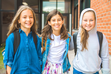 Some nice kids on the school background having fun