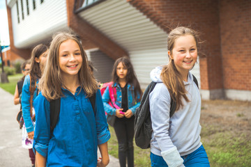 Some nice kids on the school background having fun