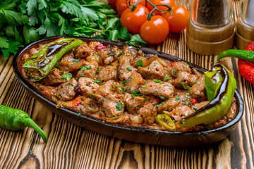 skewers of chop shish Turkish cuisine on wooden table