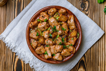 skewers of chop shish Turkish cuisine on wooden table