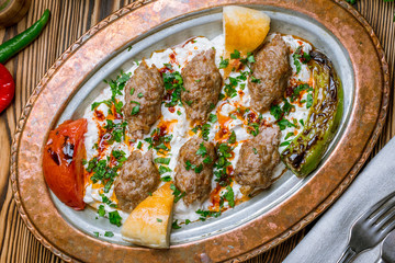 Ali Nazik Turkish cuisine on wooden table