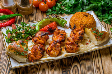 chicken kebab Turkish cuisine on wooden table