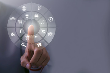 Businessman pressing virtual icons,Close up of businessman touching icon of media screen