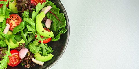 salad healthy, vegetables (avocado, tomato, mix leaves, arugula, lettuce, onions and more) top menu concept. food background. copy space