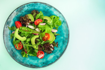 salad healthy, vegetables (avocado, tomato, mix leaves, arugula, lettuce, onions and more) top menu concept. food background. copy space