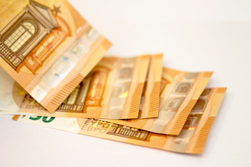 Fifty euro banknotes spread out isolated on white