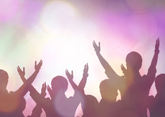 soft focus of christian people group raise hands up worship God Jesus Christ together in church...