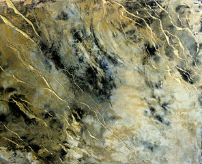 The texture of the stone is marble with gold streaks. Decorative plaster. Venetian plaster