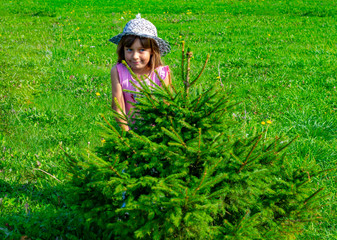 child 6-7 years old plays in the park