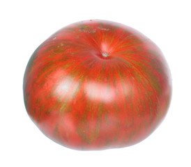 Red tomato with green stripes isolated on white background