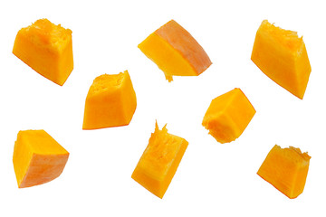 Pumpkin slices isolated on a white background, top view. Sliced pumpkin isolated on white. Pieces...