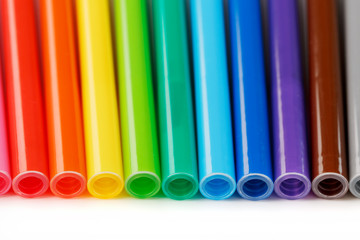 Multi-colored felt-tip pens, markers on a white isolated background