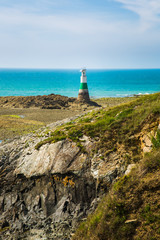 Pléneuf-Val-André Lighthouse with Turquoise Blue Atlamtic Ocean on a Sunny Summer Day in Brittany France