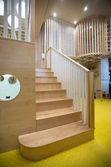 Wooden stairway in home interior design