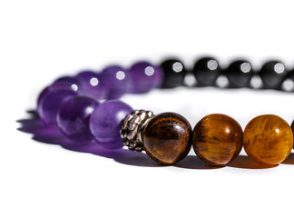 amethyst, obsidian, quartz mineral, tiger eye mineral stones isolated on white background 