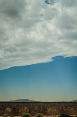 dramatic clouds over mountains