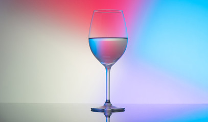 wine glasses dishes on a colored background