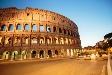 Fototapeta na wymiar The Colosseum at night. Rome fantastic city, a historical monument