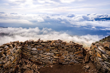 Stone shelter on top of the mountainous peak of Peñarala, in the Sierra de Guadarrama, Spain.