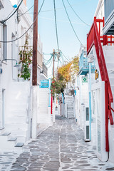 Typical Greek architecture in the white, cobbled alleys of Mykonos town, houses in the old town of...