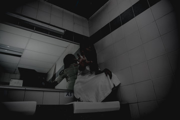 Portrait of asian woman make up ghost face with blood,Horror scene,Scary background,Halloween...