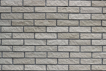 Modern grey brick wall. Space for text or logos